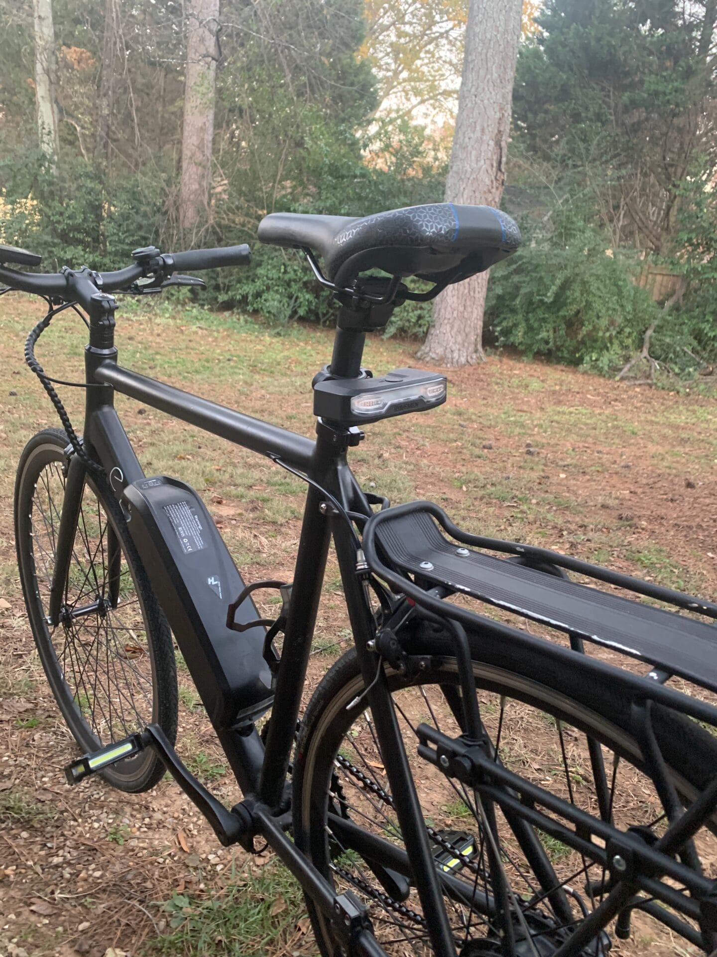 light mounted to seat post of bike