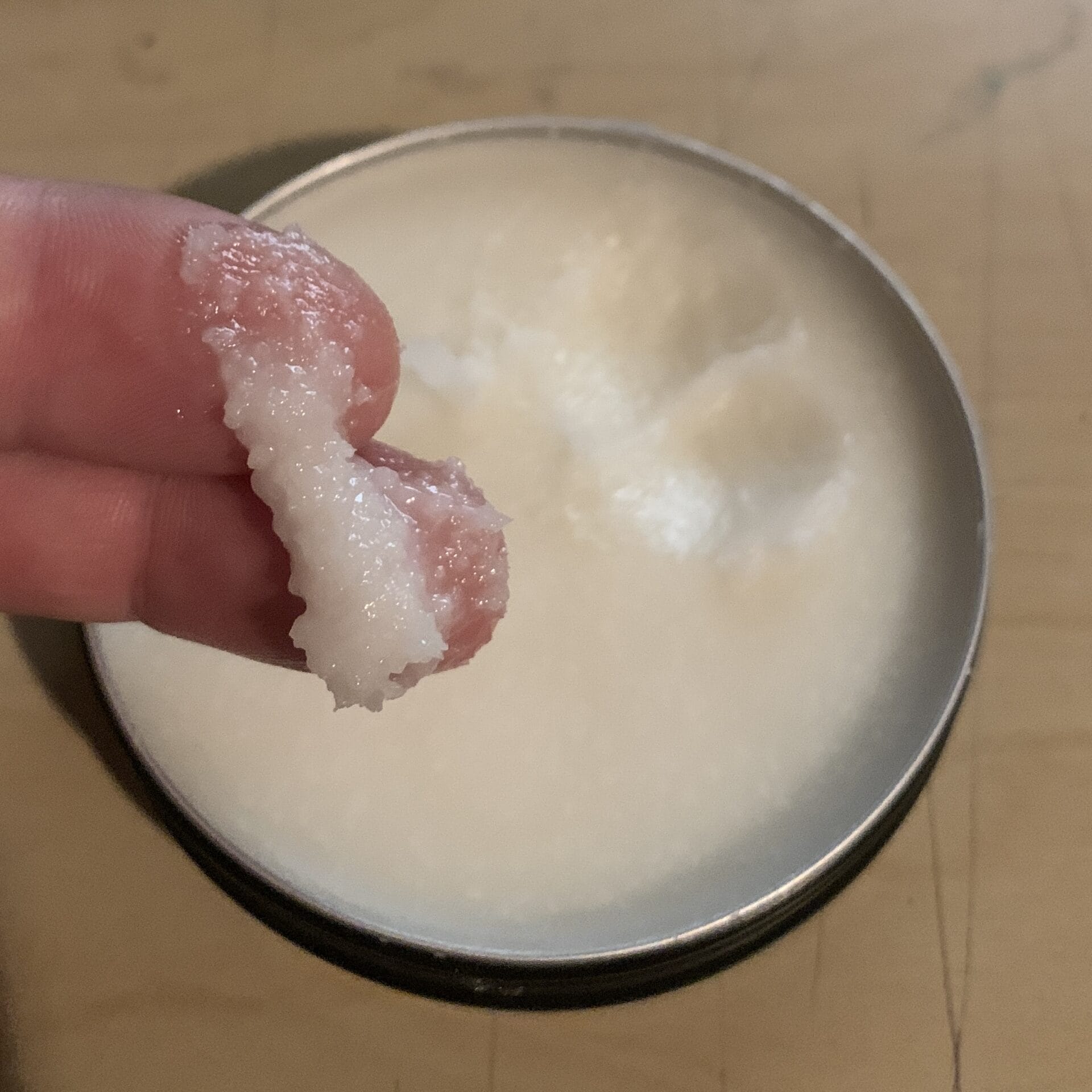 Velovare chamois cream with cream on fingers before applications