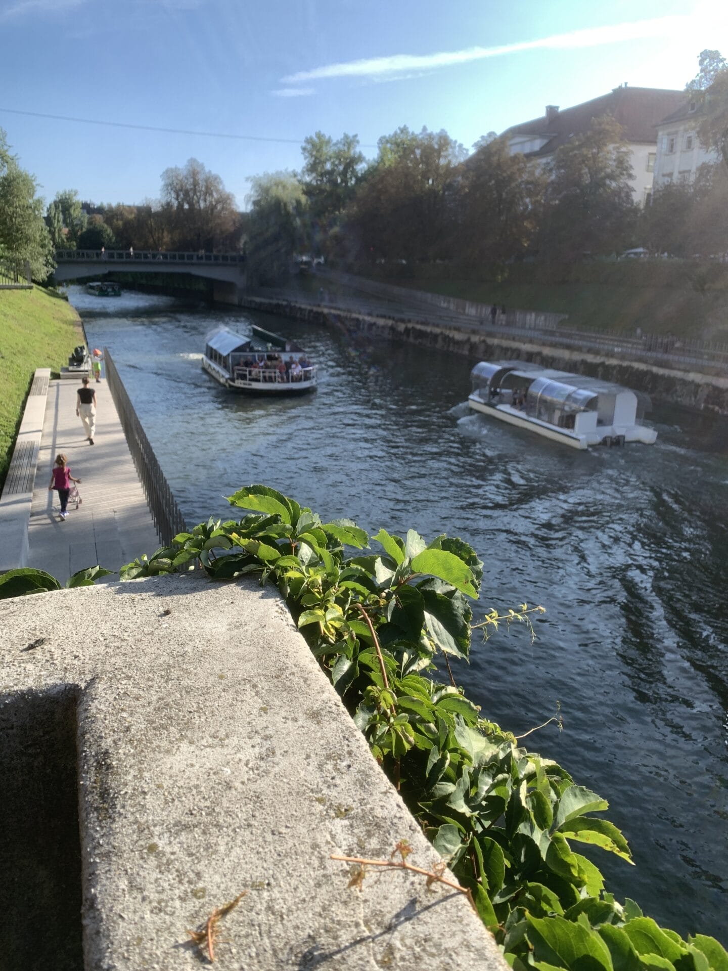 Boats in the river in the middle of Ljubljana