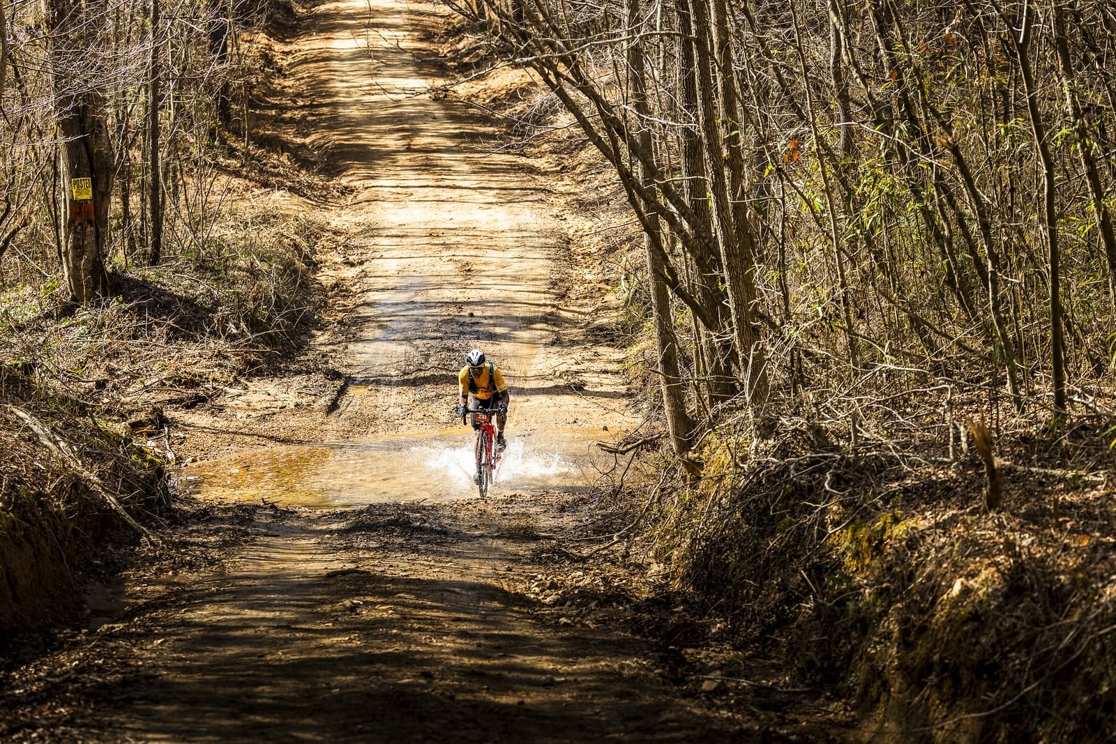 Rider Crosses creek on course