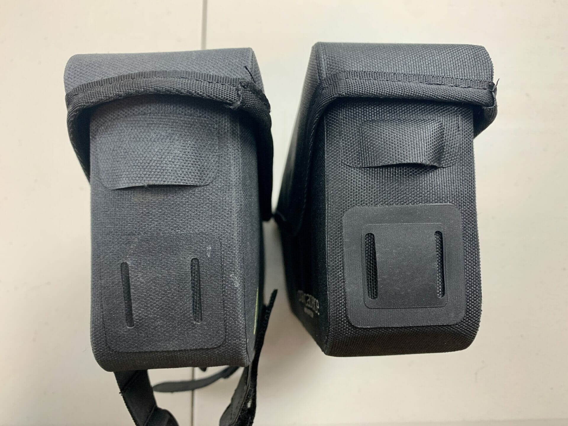 side by side comparison of strap version to bolt on version