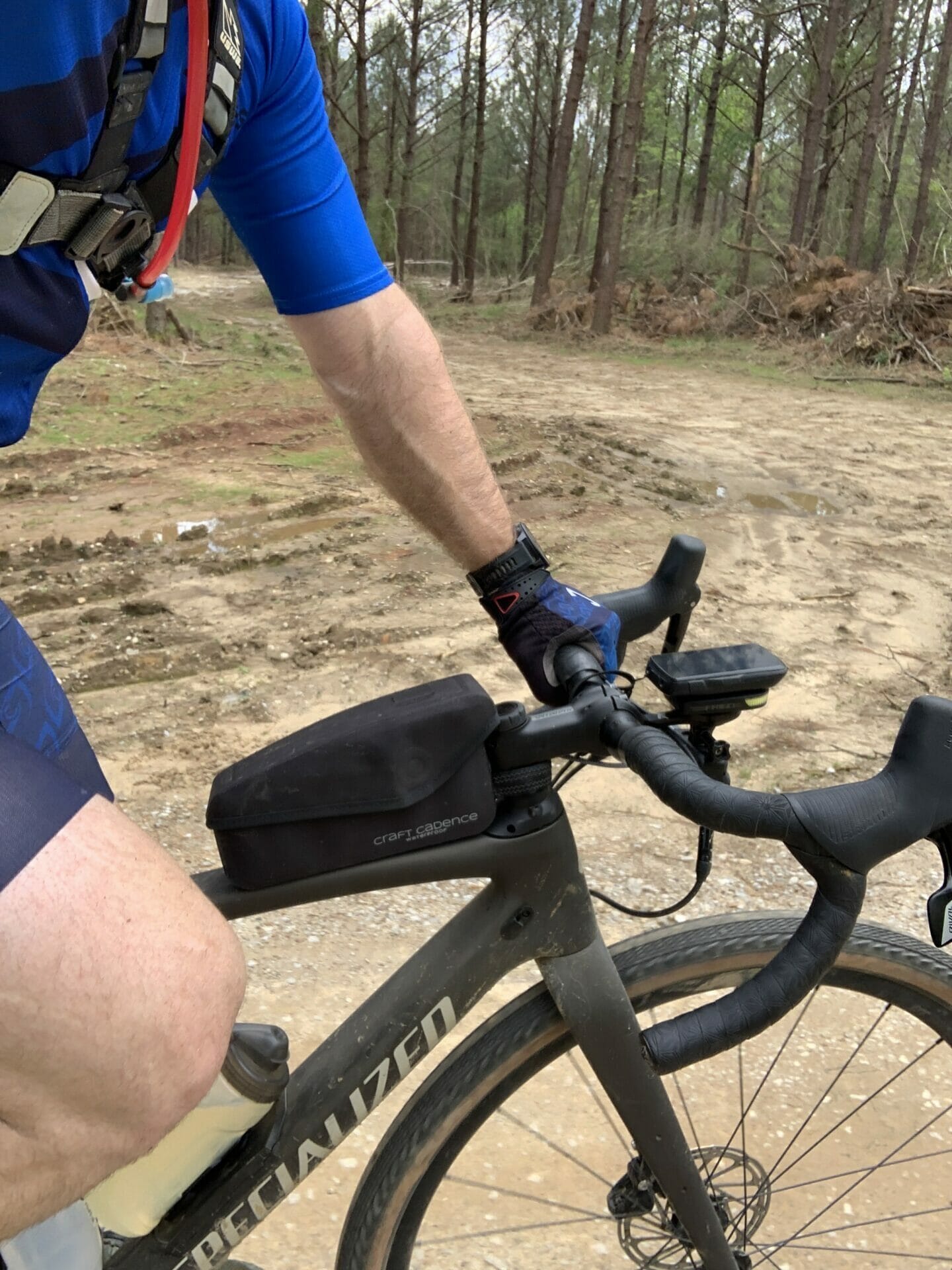 Riding gravel bike with Craft Cadence bolt on top tube bag