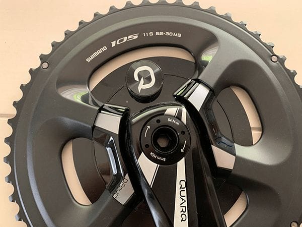 Chainring and crankset showing that the 105 chainrings are a matte finish and the DFour crankset is a glossy finish